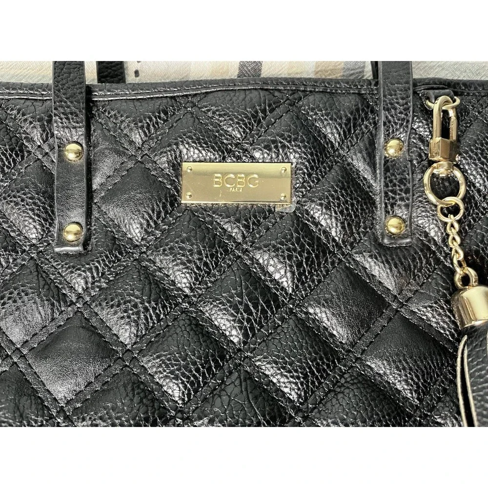 BCBG Women's Black Quilted Faux Leather Tote Bag with Tassel Accent